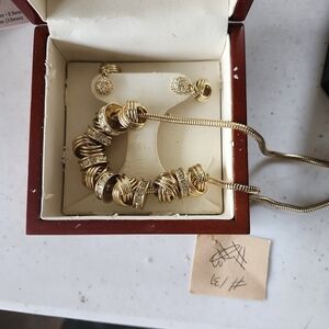 Gold toned and crystal necklace and earrings set